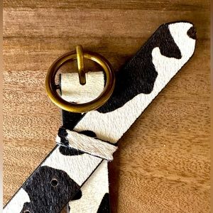 Cow print belt, size medium/large.